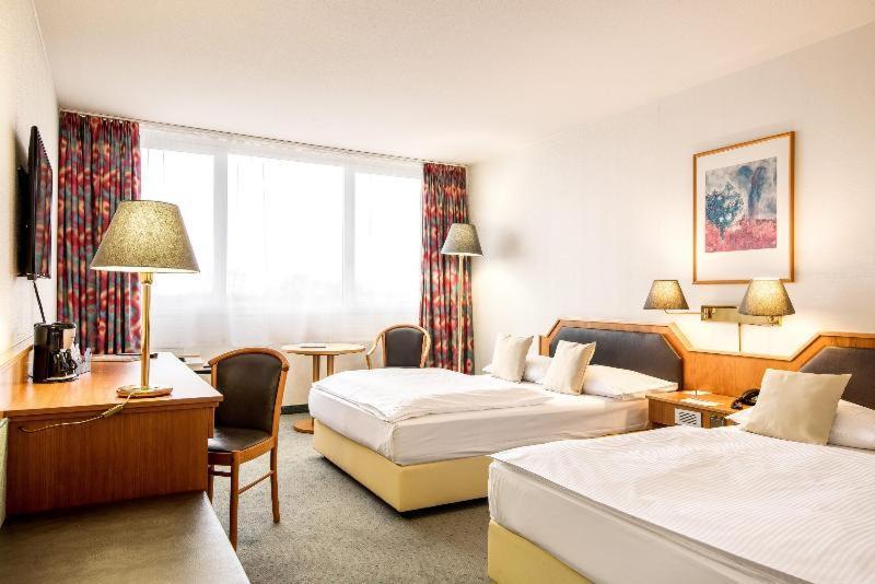 Leoso Hotel Ludwigshafen Pokoj fotografie